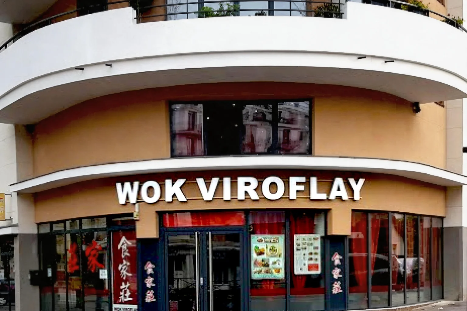 The Wok Viroflay frontage, white sign above the windows